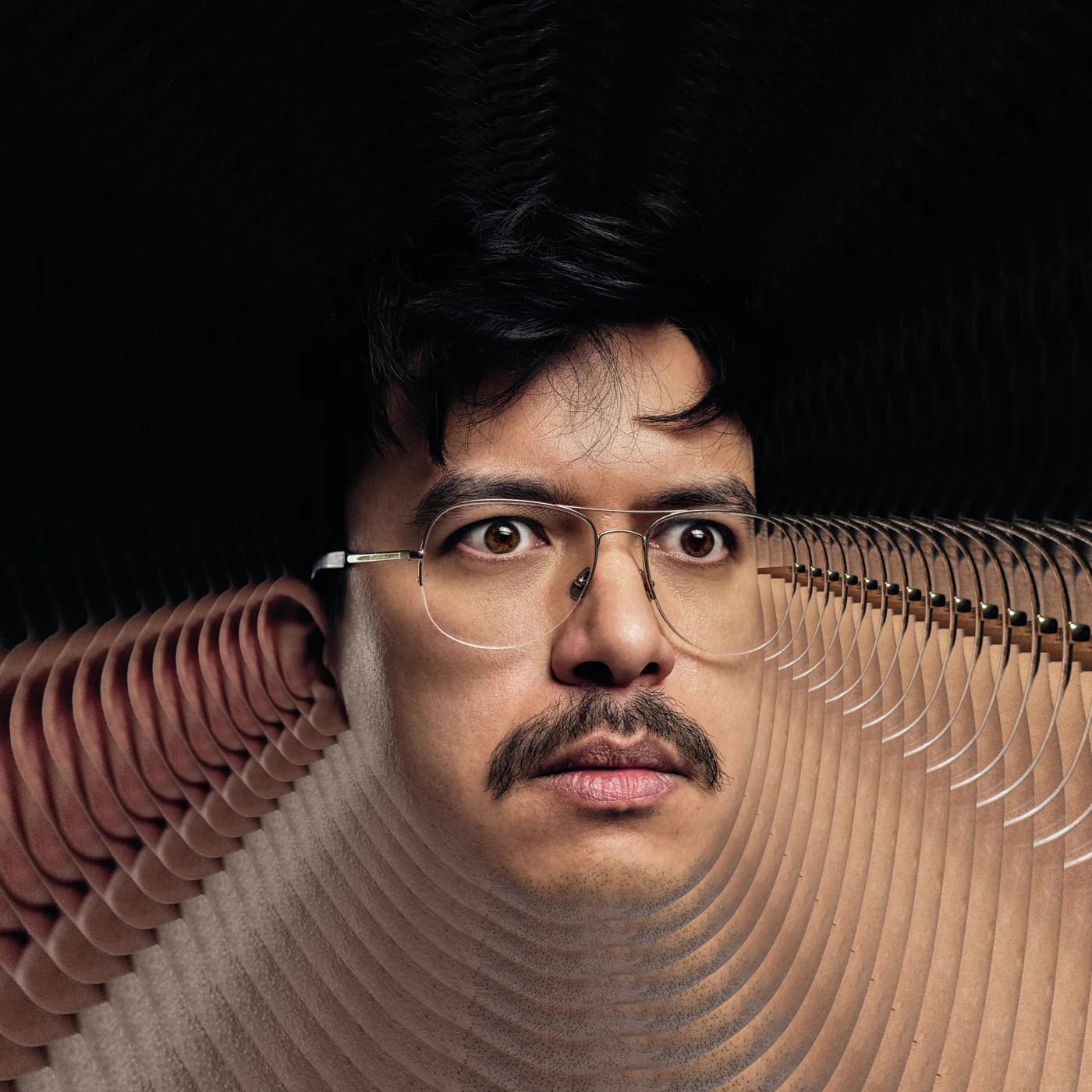 Phil Wang, with glasses and a moustache, in a stylised portrait