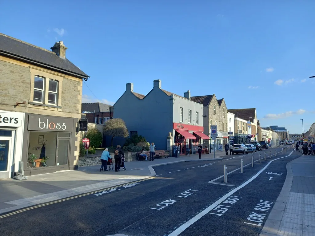 Keynsham High Street, redesigned as a one-way street. The banned right turn at its southern end, into Temple Street, is one of the six restrictions now covered by camera enforcement